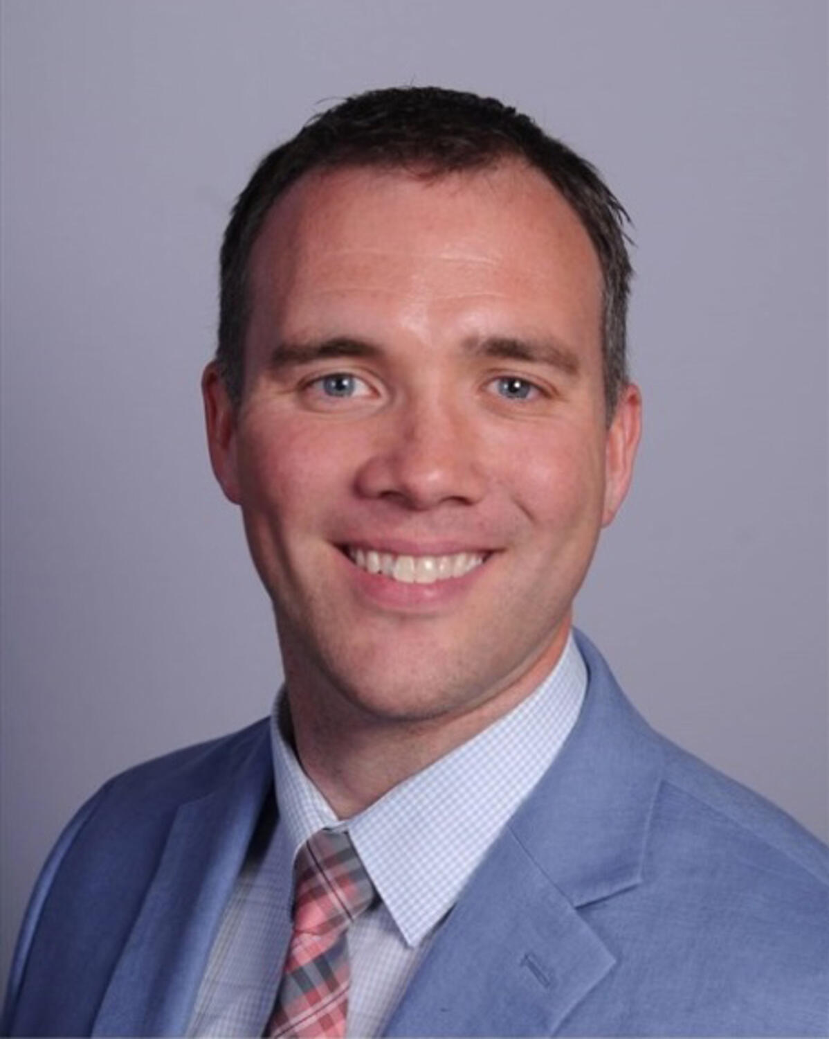 Headshot Image for Thomas England